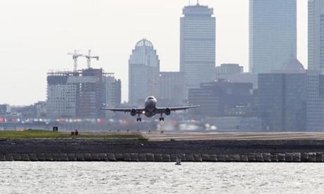 Logan Airport officials plan to curb energy consumption, cut emissions, and spend millions to protect runways from rising seas.
