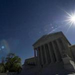 The sun shines over the Supreme Court as they hold a hearing on same-sex marriage, in Washington, Tuesday, April 28, 2015. The opponents of same-sex marriage are urging the court to resist embracing what they see as a radical change in society's view of what constitutes marriage. (AP Photo/Cliff Owen)