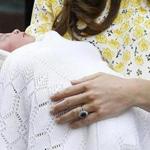 Kate Duchess of Cambridge held her newborn baby as they left St. Mary's Hospital. 
