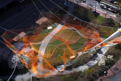 Janet Echelman?s aerial sculpture was suspended above the Rose Kennedy Greenway on Sunday.
