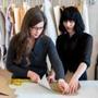 At Good Clothing Co. in Mashpee, founder Kathryn Hilderbrand (left) reviewed patterns with Aiste Zitnikaite.