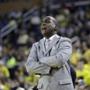Head coach Michael Grant of the Coppin State University Eagles shouts instructions to his team during the first half of a game against the Michigan Wolverines at Crisler Arena on December 22, 2014 in Ann Arbor, Michigan. Michigan defeated Coppin State 72-56.(Photo by Duane Burleson/Getty Images)