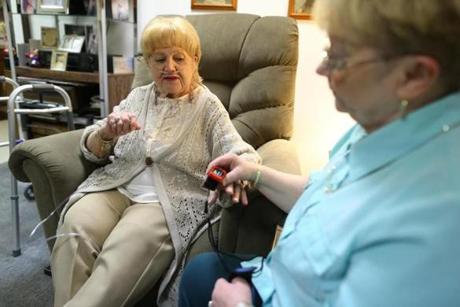 Rose Fiorino (left) sees nurse practitioner Gail Metcalf at least once a month.
