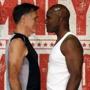 Mitt Romney (left) and five-time heavyweight champion Evander Holyfield stared down during their weigh-in. 