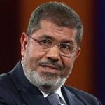 Former Egyptian president Mohamed Morsi raised his hands while standing in the defendant?s cage as a judge read out his death sentence. Morsi was sentenced to death for his role in a 2011 prison break.