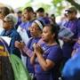 Tufts University janitors and supporters gathered in Powder House Square on Saturday afternoon.