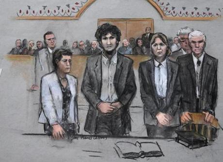 The jury rejected the four key aspects of Dzhokhar Tsarnaev?s defense case. Pictured: Tsarnaev stood with his attorneys as his sentence was read on Friday.
