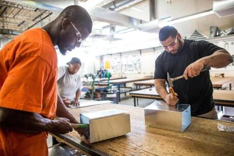 Patrick Pochette (left) and Jonathan Rivera trained at the Sheet Metal Workers Union Local 17 Training Center in Boston, which hosted Building Pathways, a six-week training initiative launched by Mayor Martin J. Walsh in 2011 when he ran the Building Trades Council. 
