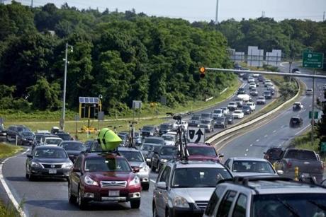 Traffic jams like this one near the Sagamore Bridge in July 2013 have boosted a proposal to use a public-private partnership to erect a third bridge across the Cape Cod Canal.
