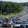 Traffic jams like this one near the Sagamore Bridge in July 2013 have boosted a proposal to use a public-private partnership to erect a third bridge across the Cape Cod Canal.