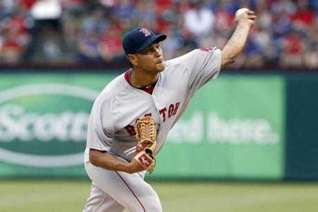 May 28, 2015; Arlington, TX, USA; Boston Red Sox starting pitcher Eduardo Rodriguez (52) throws a pitch in the first inning against the Texas Rangers at Globe Life Park in Arlington. Mandatory Credit: Tim Heitman-USA TODAY Sports

