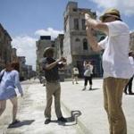 Visitors to Cuba?s capital Friday included US artists and art curators attending the Havana Biennial exhibition.