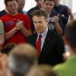 Republican presidential candidate, Sen. Rand Paul, R-Ky. acknowledges a cheering New Hampshire crowd earlier this month.
