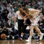 Kevin Love and Kelly Olynyk got tangled going for a rebound during Game 4 of the first round of the playoffs.