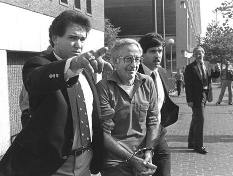FBI agent John Connolly Jr. (left) took Francesco Angiulo (center) to court in 1983.
