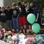 Friends join together as they play a song for Shane Farrell, a 13 year old boy who was killed by a school bus while riding his bike in Mansfield, Massachusetts June 4, 2015.