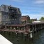 Lewis Wharf is now mostly a parking lot. But a proposal to redevelop the site in the North End (below) includes a hotel, residences, a park area, and a new home for the Boston Sailing Center.