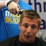 Rob Gronkowski gets his head shaved at the fund-raiser.