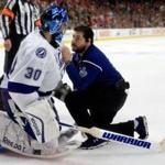 Lightning goaltender Ben Bishop received medical attention in the second period against the Blackhawks.