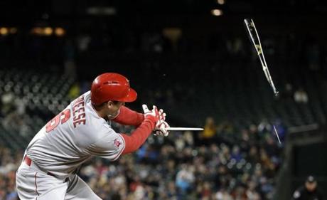 Maple bats, which came into vogue after Barry Bonds?s success in 2001, are much more likely to suffer a ?multi-piece break,? where the barrel completely separates from the handle. Above: Angels infielder David Freese suffered such a break earlier this season.
