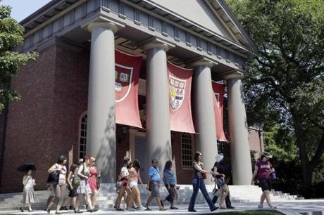 Visitors walked through Harvard?s campus.

