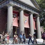 Visitors walked through Harvard?s campus.