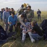Russian cosmonaut Anton Shkaplerov rested in a chair outside the Soyuz TMA-15M space capsule after he and other astronauts landed in a remote area of Kazakhstan. 