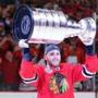 Jun 15, 2015; Chicago, IL, USA; Chicago Blackhawks right wing Patrick Kane hoists the Stanley Cup after defeating the Tampa Bay Lightning in game six of the 2015 Stanley Cup Final at United Center. Mandatory Credit: Dennis Wierzbicki-USA TODAY Sports