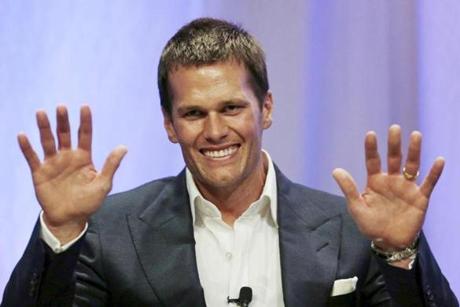New England Patriots quarterback Tom Brady speaks at Salem State University in Salem, Massachusetts in this file photo from May 7, 2015. Brady, suspended for the first four games next season for his role in 'Deflategate,