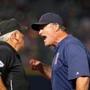 Jun 17, 2015; Atlanta, GA, USA; Boston Red Sox manager John Farrell (53) argues a call with first base umpire Larry Vanover (27) in the seventh inning of their game against the Atlanta Braves at Turner Field. Mandatory Credit: Jason Getz-USA TODAY Sports