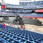 Base soil is spread Wednesday on the field at Gillette Stadium in preparation for Saturday?s Monster Jam.