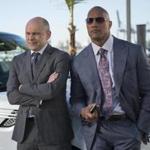 Rob Corddry (left) and Dwayne ?The Rock? Johnson.
