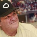 FILE - In this July 26, 2011, file photo, former Cincinnati Reds player Pete Rose signs autographs at the Collectors Den in at a mall in Indianapolis. Rose has submitted a new request to be reinstated to baseball, according to new Commissioner Rob Manfred. After meeting with the Los Angeles Dodgers on Monday, March 16, 2015, Manfred said 
