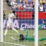 Jun 22, 2015; Edmonton, Alberta, CAN; United States forward Alex Morgan (13) scores a goal during the second half against the Colombia in the round of sixteen in the FIFA 2015 women's World Cup soccer tournament at Commonwealth Stadium. Mandatory Credit: Erich Schlegel-USA TODAY Sports
