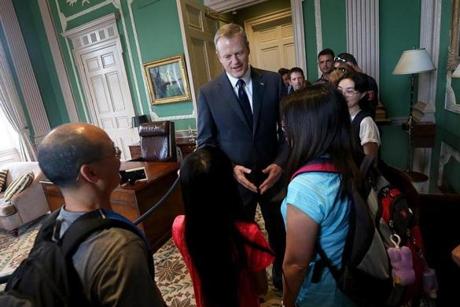 Governor Charlie Baker greeted tourists in the ceremonial governor's office on Thursday.
