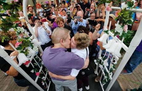 Ann Sorrell (left) and Marge Eide embraced after exchanging vows in Ann Arbor, Michigan.
