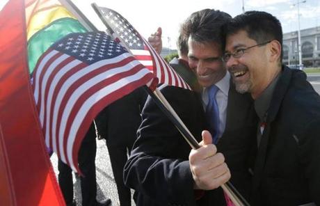State Senator Mark Leno (left) hugged gay rights advocate Stuart Gaffney in San Francisco.

