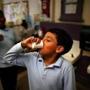 Ethan Mariluz drank bottled water from a paper cup after recess at the Edward Everett Elementary School.