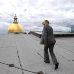 Tammy Kraus walked on the roof of the State House with a view of its iconic dome. 