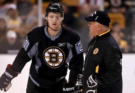 Boston Ma 09/14/2013 Boston Bruins player Dougie Hamilton (cq) left with head coach Claude Julien (cq) right at Training Camp.( Jonathan.Wiggs )Topic:Section:Reporter: Topic: Reporter:

