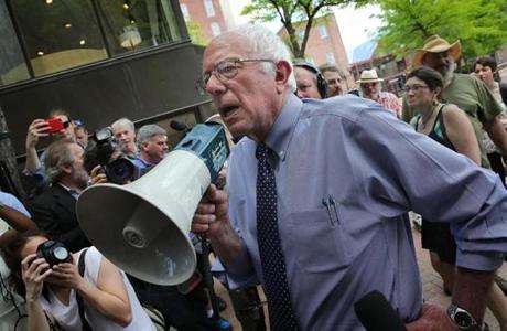 Bernie Sanders used a megaphone to speak to a crowd at a campaign event at New England College in Concord, N.H., on May 27. 
