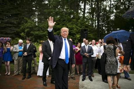 Businessman and Republican presidential candidate Donald Trump greets supporters during a back-yard reception in Bedford, New Hampshire, June 30, 2015. REUTERS/Dominick Reuter
