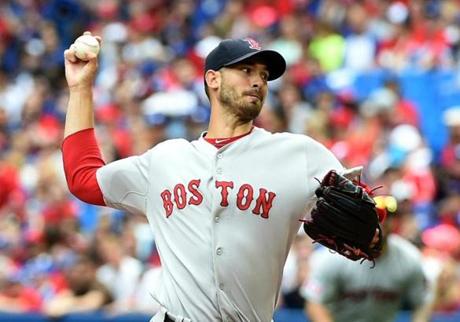 Jul 1, 2015; Toronto, Ontario, CAN; Boston Red Sox starting pitcher Rick Porcello (22) delivers a pitch against the Toronto Blue Jays at Rogers Centre. Mandatory Credit: Dan Hamilton-USA TODAY Sports
