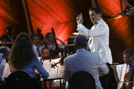 Boston Pops conductor Keith Lockhard led the orchestra at the Hatch Shell.
