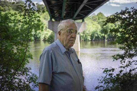Retired justice Stephen Martin posed under the bridge (since rebuilt) from which Vermont farmer Orville Gibson?s body tumbled into the Connecticut River in late 1957. 
