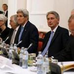 Secretary of State John Kerry, 3rd left, met with his counterparts from other countries at a hotel in Vienna, Austria. 