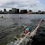 Barbara Grandbreg did the backstroke in the Charles River during CitySplash at the Esplanade. 