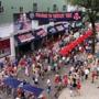 Fans congregate on Yawkey Way, home to concession stands since a 2013 deal with the city granted the Red Sox rights to the space.