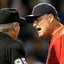 BOSTON, MA - JUNE 23: John Farrell #53 of the Boston Red Sox has words with umpire Tim Timmons #95 at the start of the seventh inning during a game with Baltimore Orioles at Fenway Park on June 23, 2015 in Boston, Massachusetts. (Photo by Jim Rogash/Getty Images)