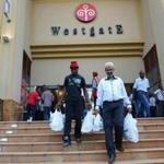 Customers left the Westgate Mall after it reopened on Saturday.